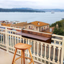 Hanging table for outdoor spaces Space-saving balcony furniture Adjustable balcony table Handcrafted balcony table Balcony table for small spaces