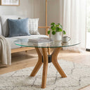 Runder Couchtisch mit Schmetterlingsbeinen aus Massivholz