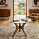 Runder Couchtisch mit Schmetterlingsbeinen aus Massivholz